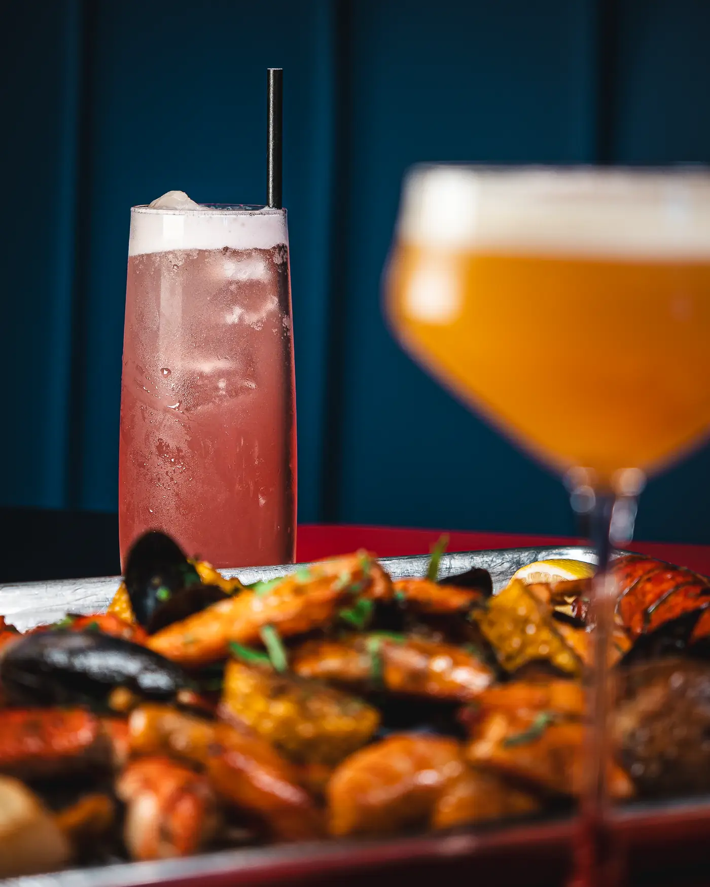 Cocktails on the bar at Seafood City Birmingham — gift a night out at the Arcadian